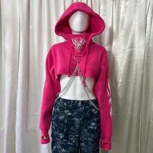 Dolls Kill Club Exx cropped pink hoodie with reflective details and chains